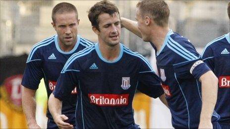 Matthew Upson (left) and scorer Danny Pugh