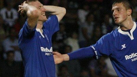 Birmingham's Stephen Caldwell (left) reacts next to teammate Chris Wood