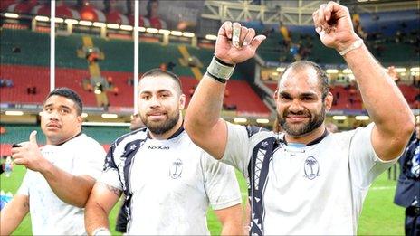Deacon Manu (right) celebrates Fiji's draw with Wales in November 2010
