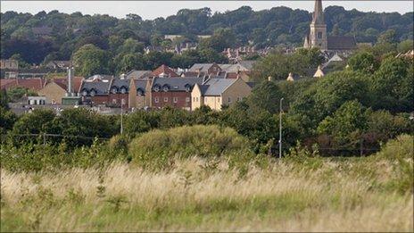 Housing next to fields (image courtesy National Trust)