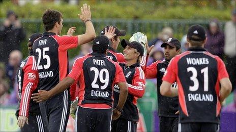 England celebrate the wicket of Paul Stirling