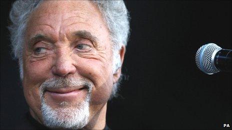 Sir Tom Jones performing at Newbury racecourse on 13 August