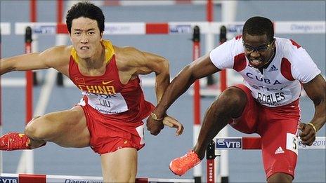 Liu Xiang of China (left) and Cuba's Dayron Robles