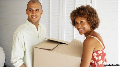 Man and woman with box