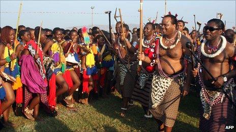 Unmarried Swazi women dance for King Mswati III (2nd r) at Ludzidzini Royal Residence near the capital, Mbabane on 29 August