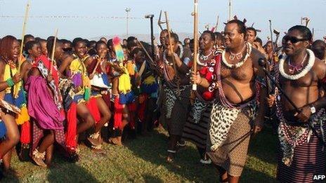 Unmarried Swazi women dance for King Mswati III (2nd r) at Ludzidzini Royal Residence near the capital, Mbabane on 29 August