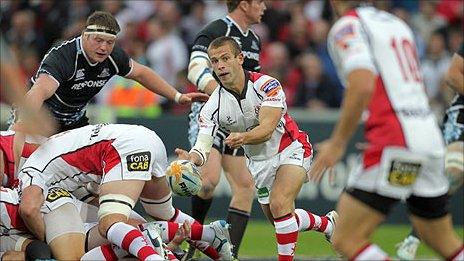 Ulster scrum-half Paul Marshall gets his pass away against Glasgow