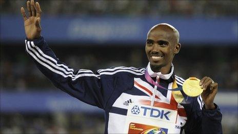 Mo Farah collects his 5,000m gold medal