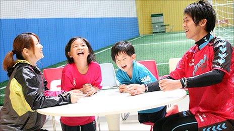 Dai Saito and his family at an indoor football centre in Tokyo