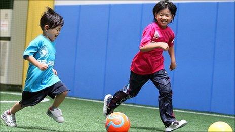 Dai Saito's children, playing indoor football