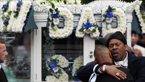 Friends and family attend the funeral of Mark Duggan