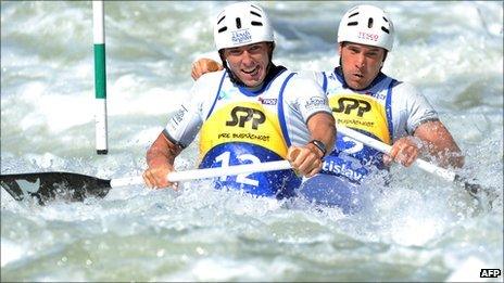 David Florence (L) and Richard Hounslow of Britain compete in the C2 men's final race