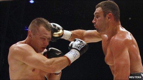 Vitali Klitschko (right) was too powerful for Tomasz Adamek