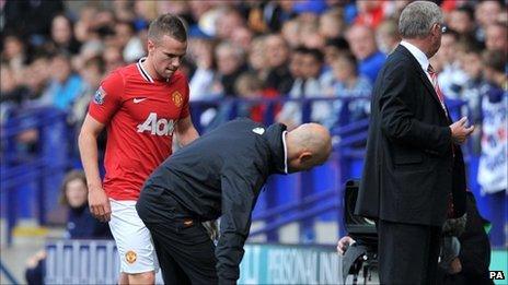 Tom Cleverley (left) was injured at Bolton