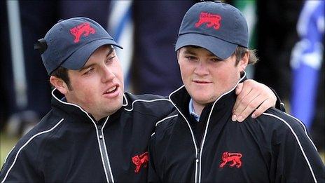 Paul Cutler (left) and Alan Dunbar celebrate a foursomes win in the Walker Cup