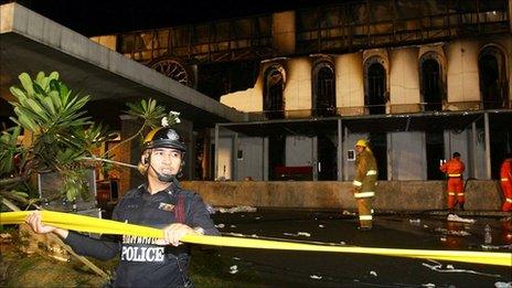 Thai police at the site of the fire on 1 January 2009