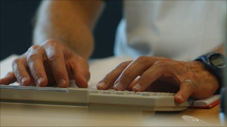 Person typing on a computer