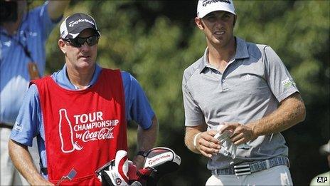 Joe LaCava (left) talks to Dustin Johnson during the final round of the Tour Championship golf tournament