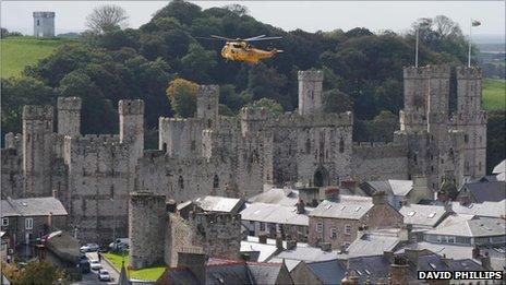 RAF rescue helicopter above Caernarfon Castle