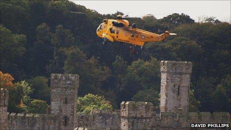 RAF rescue helicopter above Caernarfon Castle. Pic: David Phillips