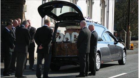 Mourners at the funeral of Garry Jenkins in Lower Cwmtwrch.