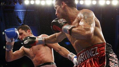 Darren Barker (left) is hit by Sergio Martinez