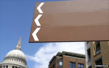 Blank direction signs in city