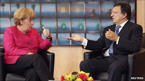 German Chancellor Angela Merkel (left) talks to European Commission President Jose Manuel Barroso