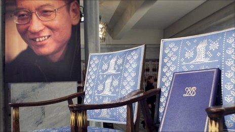 A picture of Liu Xiaobo next to his empty chair at the Nobel prize ceremony on 10 December 2010