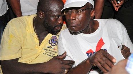 George Weah (l) and Winston Tubman on 7 October