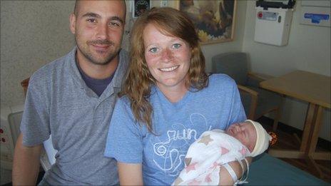 Amber Miller with baby June and husband, Joe - 10 October 2011