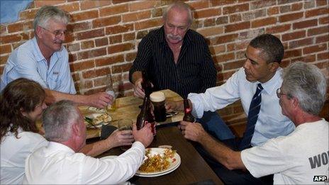 US President Barack Obama with unemployed construction workers in Orlando, Florida, on 11 October 2011