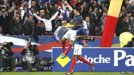 Samir Nasri and Loic Remy celebrate the former's goal in Paris