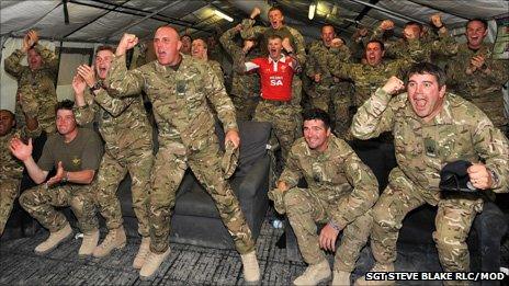 Soldiers from the Queen's Dragoon Guards - known as the Welsh cavalry - support Wales in Camp Bastion in Afghanistan