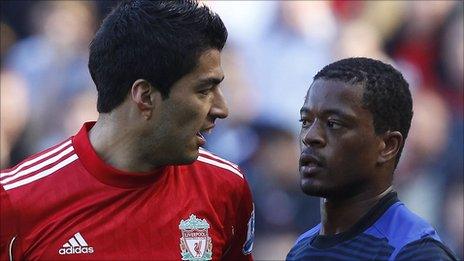 Luis Suarez and Patrice Evra