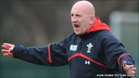 Wales defence coach Shaun Edwards makes a point during training