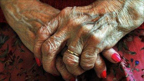 An elderly woman's hands