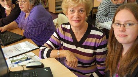 Jean Groves and Sarah, who is helping her learn to use a computer