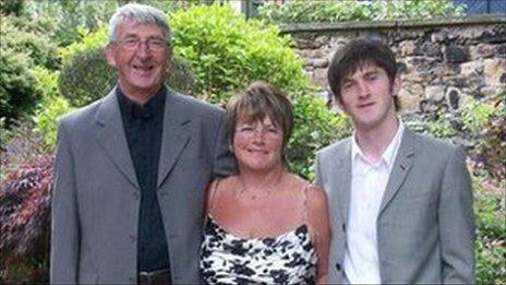 David Rogers (left) with his wife Pat and Adam