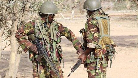 Kenyan soldiers prepare to advance near Liboi in Somalia, 18 October 2011