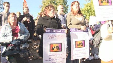 Protesters holding banners in Norwich