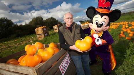 Lincolnshire farmer, David Bowman shows off the crop of Mickey Mouse shaped pumpkins