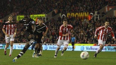 Newcastle's Demba Ba scored his third from the spot