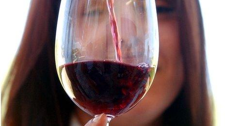 Pouring glass of wine