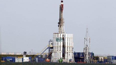 Protestors scale a shale gas rig near Southport