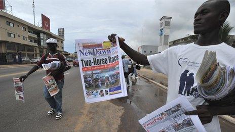 Newspaper sellers on the streets of Monrovia