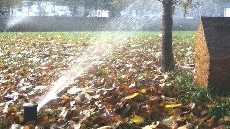 Parade Park in Jersey with sprinklers on