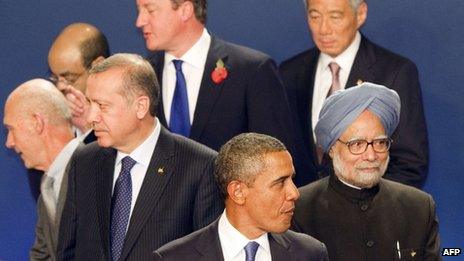 US President Barack Obama (centre) with other world leaders at G320 in Cannes, France, on 3 November 2011