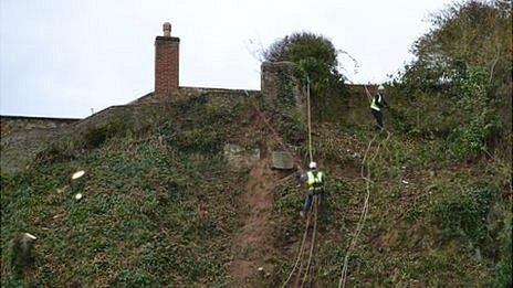 Work begins to repair a land slip on a Guernsey cliff path