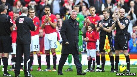 Sir Alex Ferguson (centre) receives a guard of honour at Old Trafford